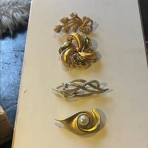 Monet Gold and Silver Brooch Set